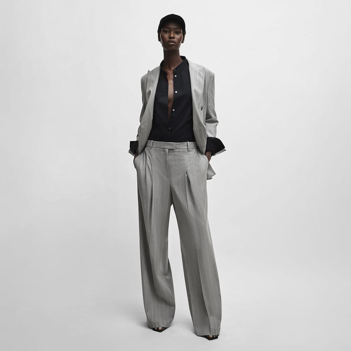 Calça Travlar Boss x Naomi Calça Travlar Boss x Naomi