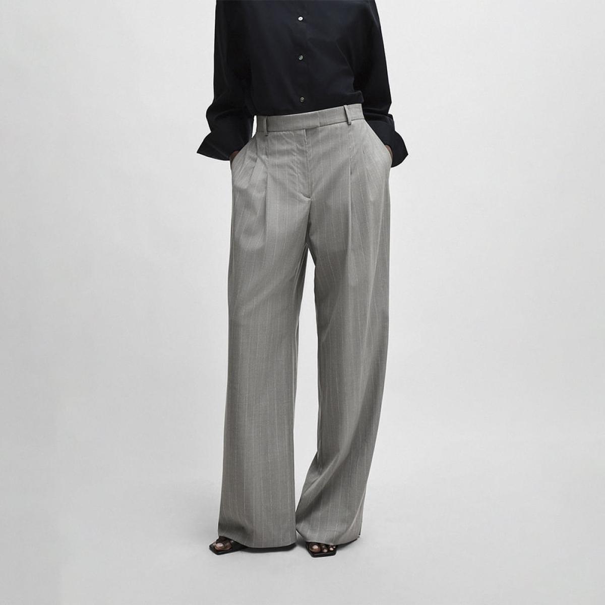 Calça Travlar Boss x Naomi Calça Travlar Boss x Naomi
