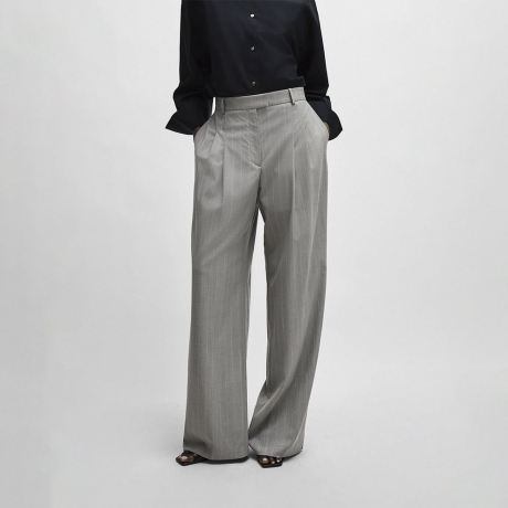 Calça Travlar Boss x Naomi Calça Travlar Boss x Naomi